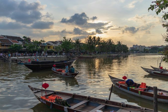 people riding on boat on water during daytime