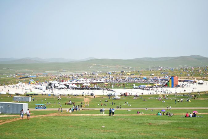 people on green grass field during daytime